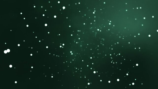 Glowing green particles drift slowly through a dark void creating a mesmerizing motion effect and cinematic atmosphere to this elegant digital background for various creative video projects.