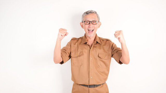 Civil worker man or teacher raising hands celebrating success