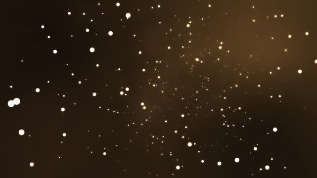 Floating golden particles drift slowly through dark space creating a dreamlike atmosphere in this high quality motion animation loop that captures the essence of soft light and elegant glowing depth.