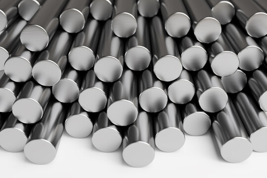 Stack of steel round bars on white surface. sensitive focus, 3D render.
