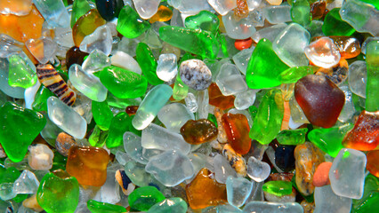 A colourful carpet of sea glass, smoothed by the erosive action of the tides, on the shores of the Atlantic Ocean. © Delfim Sa Neiva