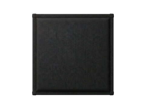 Minimalist black foam soundproofing panel resting on clean white surface.