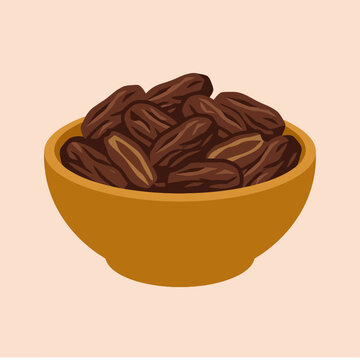 A wooden bowl filled with sweet dried brown dates fruit