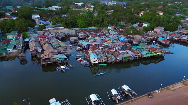 Coron Palawan stilt houses built settlement over water. Best aerial view drone