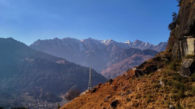 Beautiful Sunrise Aerial View of Manali Valley with Snow Covered Himalayan Mountains, Golden Morning Light, Misty Landscape, Green Forests, Peaceful Mountain Scenery, Crystal Clear Sky and Breathtakin