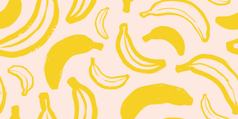 Seamless pattern with hand drawn bananas in sketchy brush style. Vibrant yellow and cream colors for tropical textiles, wrapping paper or packaging design, vector illustration © Liliya
