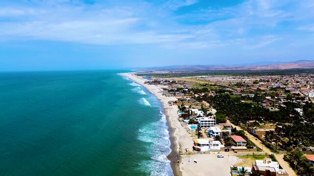 Wide Aerial View of Ecuador Coastline with Turquoise Ocean, Sandy Beach, Urban Settlement and Dry Hills, Tropical Seascape Travel Background
