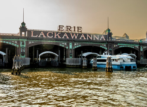 Hoboken, NJ - US - Jul 1, 2026 The Hoboken Terminal is a historic Beaux-Arts intermodal hub on the Hudson River, featuring a striking copper facade and iconic Erie Lackawanna signage.