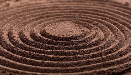 Naklejka premium Close-up macro photograph of concentric circles pattern in brown powder on surface