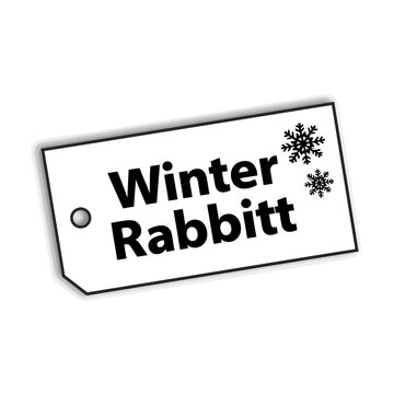 A white gift tag with the words Winter Rabbitt printed in black, accompanied by two snowflake graphics