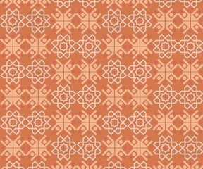 Fototapeta premium A seamless geometric pattern featuring symmetrical eight-pointed stars and circular accents in a warm orange and light orange color scheme.