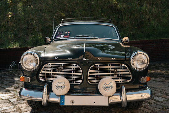 Berlin, Germany - May 3, 2026. Green Volvo classic car front view at oldtimer show.