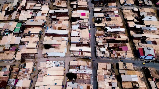 Aerial View of Dense Residential Blocks in Ecuador Coastal City, Flat Rooftops, Street Grid, Urban Texture and South American Cityscape Background