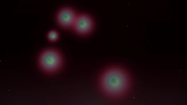 Floating glowing orbs with soft neon halos against a deep black backdrop, creating a looping, seamless overlay effect for background visuals.