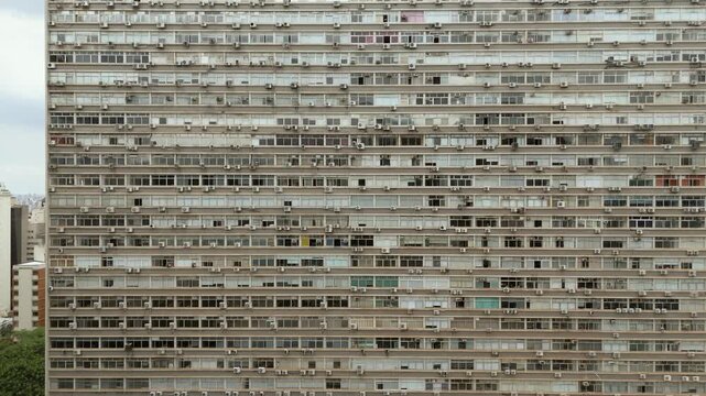 Modern and residential high-rise buildings on Avenida Paulista in S&atilde;o Paulo. Travelling camera movement