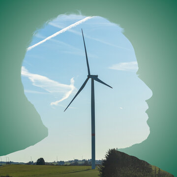 Personne ayant en t&ecirc;te une &eacute;olienne, symbolise l'&eacute;cologie et l'environnement. 