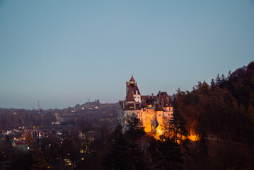 Bran castle illuminated at dusk in transylvania, romania © Chris M