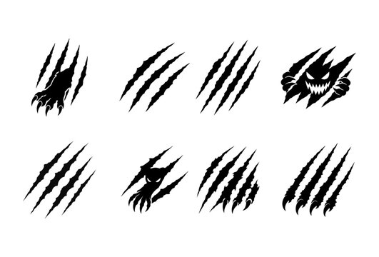 Black monster claw marks and animal scratch set with scary creature eyes and teeth.