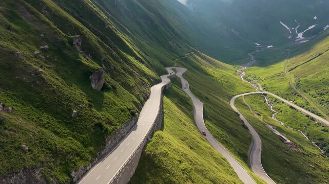 Furkapass Switzerland reveals stunning landscapes with winding roads that snake through lush green hills. Perfect for travelers seeking adventure and natural beauty in a holiday getaway.
