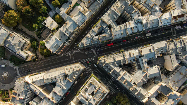 Paris city roofs and urban street intersection view