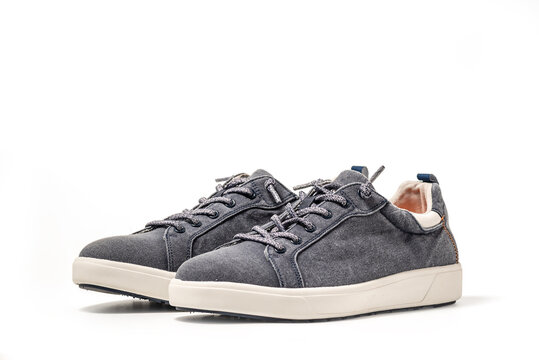 Blue Canvas Sneakers. Sport shoes isolated on white background, clipping path included