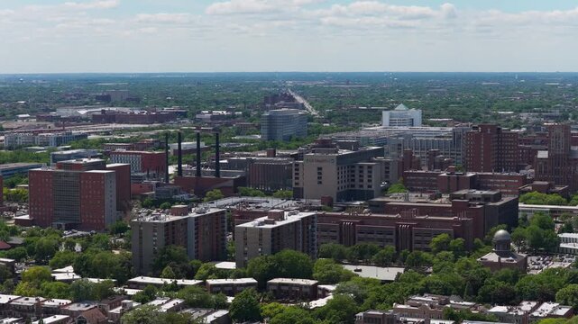 Distant aerial showing Chicago's West Loop Gate neighborhood and Illinois Medical District with Cook County Hospital, Rush University Medical Center, residential apartments