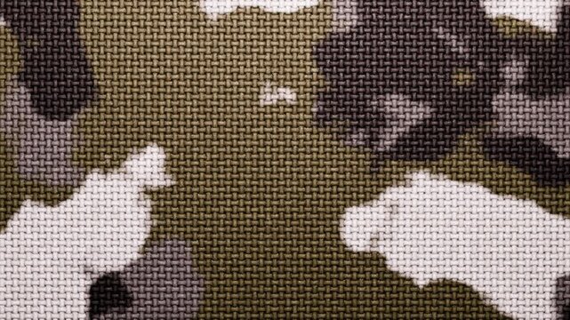 Camouflage fabric texture loop with muted abstract cloth pattern