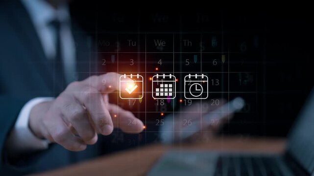 Businessman touching a virtual calendar icon to schedule an appointment, managing business planning, project timeline, event reminder, and corporate deadline with a smartphone and a laptop.