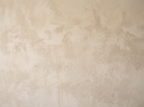 Soft Beige Plaster Wall Texture Background with Smooth Matte Surface