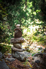 Fototapeta premium Man-made balanced stone piles (Mani Stones) in the outdoor areas of the Tibetan regions in western China