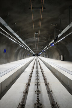 Modern Tunnel Platform with Converging Railway Tracks