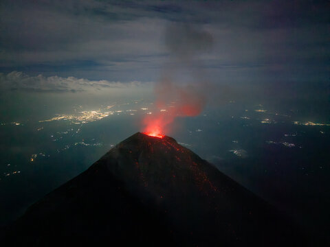Glowing lava crater of Volc&aacute;n de Fuego at night in Guatemala
