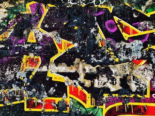 Fototapeta premium Urban graffiti grunge wall texture distressed concrete, colorful street art, weathered paint, peeling surfaces, and abstract urban details. Creative background for posters, branding, print, web design