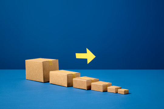 Cardboard boxes arranged in ascending order with a yellow