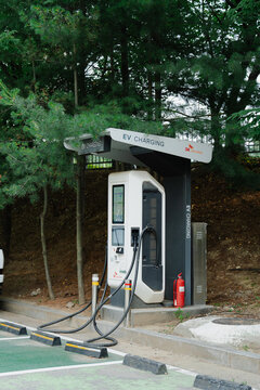 July 4, 2026, Incheon, South Korea - SK electlink electric vehicle charging station with cables and a fire extinguisher