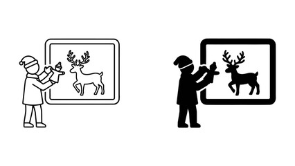 Christmas Card Artistry: A creative child, adorned in a Santa hat, skillfully crafts a festive Christmas card featuring a reindeer illustration. Two distinct artistic styles. © Asma