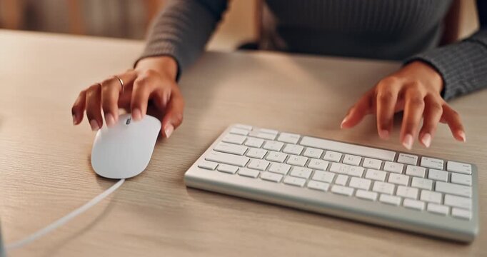 Close Up of Woman Hands Typing on Keyboard and Using Computer Mouse in Office