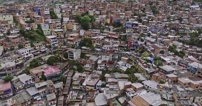 Medellin Colombia Aerial v40 flyover famous Comuna 13 capturing decrepit houses, outdoor escalators and La Independencia Calle 35f residential hillside views - Shot with Mavic 3 Cine - November 2022