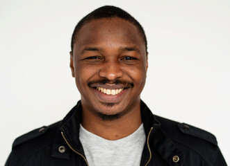 Smiling man in casual attire.