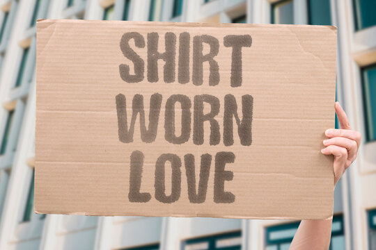 "Shirt worn love" Favorite clothes are held close by feeling. HELD, CLOSE, FEELING, SHIRT, LOVE.