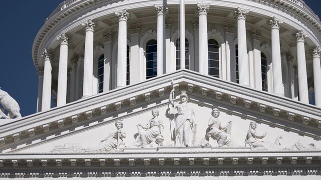 Discover the intricate designs of California State Capitol while the sun shines brightly in Sacramento, showcasing its beauty and history