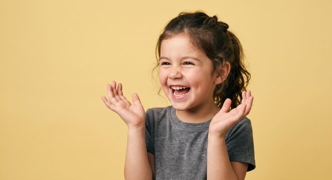 Heartfelt laughter of a charming young girl against a sunny backdrop