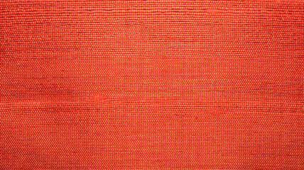 Fototapeta premium Textured Orange Fabric Background Ideal for Design and Art Projects