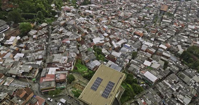Medellin Colombia Aerial v52 birds eye view flyover 13 de noviembre above El Pinal gondola station capturing hillside slums, crowded with tin-roofed shacks - Shot with Mavic 3 Cine - November 2022