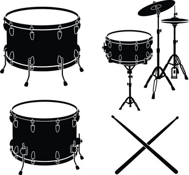 A set of drum kit components including kick snare drum and cymbals in silhouette