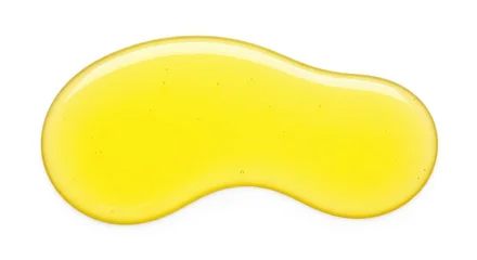 Clear yellow meadowfoam seed oil forms a smooth liquid puddle on a bright white background, showcasing high-quality natural beauty ingredients, reflective, droplet, beauty © Chanchai