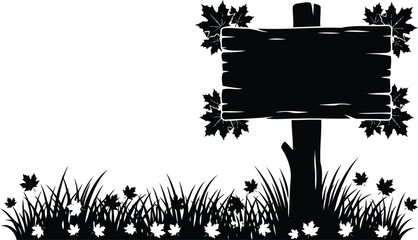 Black silhouette of wooden signpost with maple leaves and grass on white background © Shakil