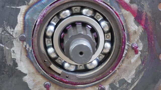 Ball bearing seal assembly inside metal housing