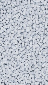 Pan across white polypropylene plastic granules and industrial masterbatch resin pellets, 3D render dynamic Vertical video.