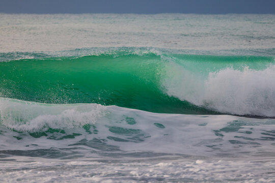 Perfect wave crashing in ocean. Ideal wave for surfing